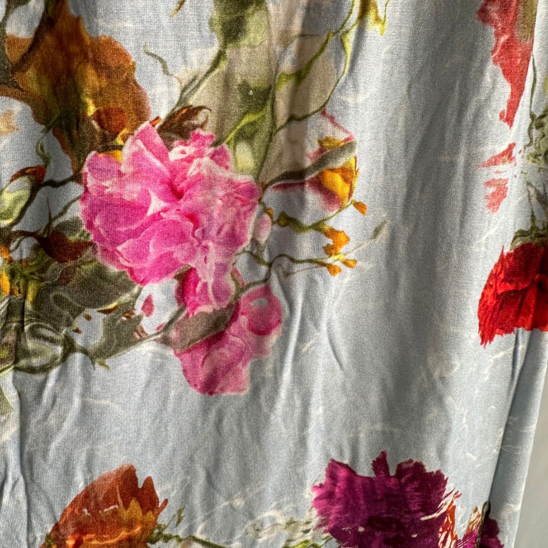 Blue Maxi length dress with large pink and red floral pattern. Soft material.