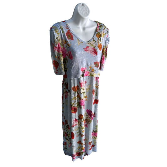 Blue Maxi length dress with large pink and red floral pattern. Soft material. Elbow length sleeves. V neck. Front flap access for easy breastfeeding and pumping. Ties around the back for tightening as needed.