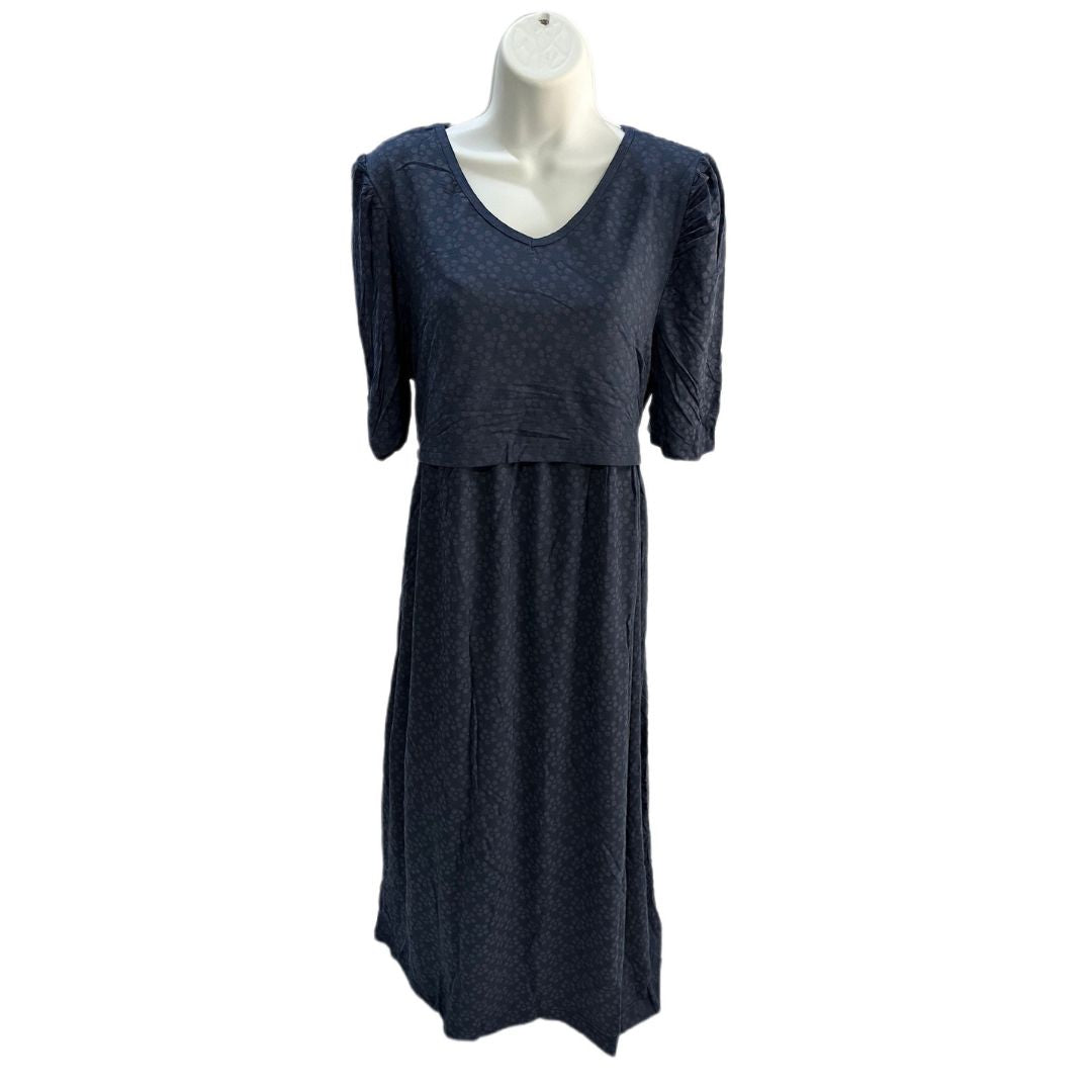 Blue, v neck, midi length dress. Puffed, 3/4 length sleeves. Pocket on right side. Strings to tie in back to tighten. Front flap for easy access for breastfeeding and pumping.